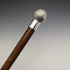 Circa 1900 British antique gentleman's walking stick, golf ball shaped, round handle, 88cm